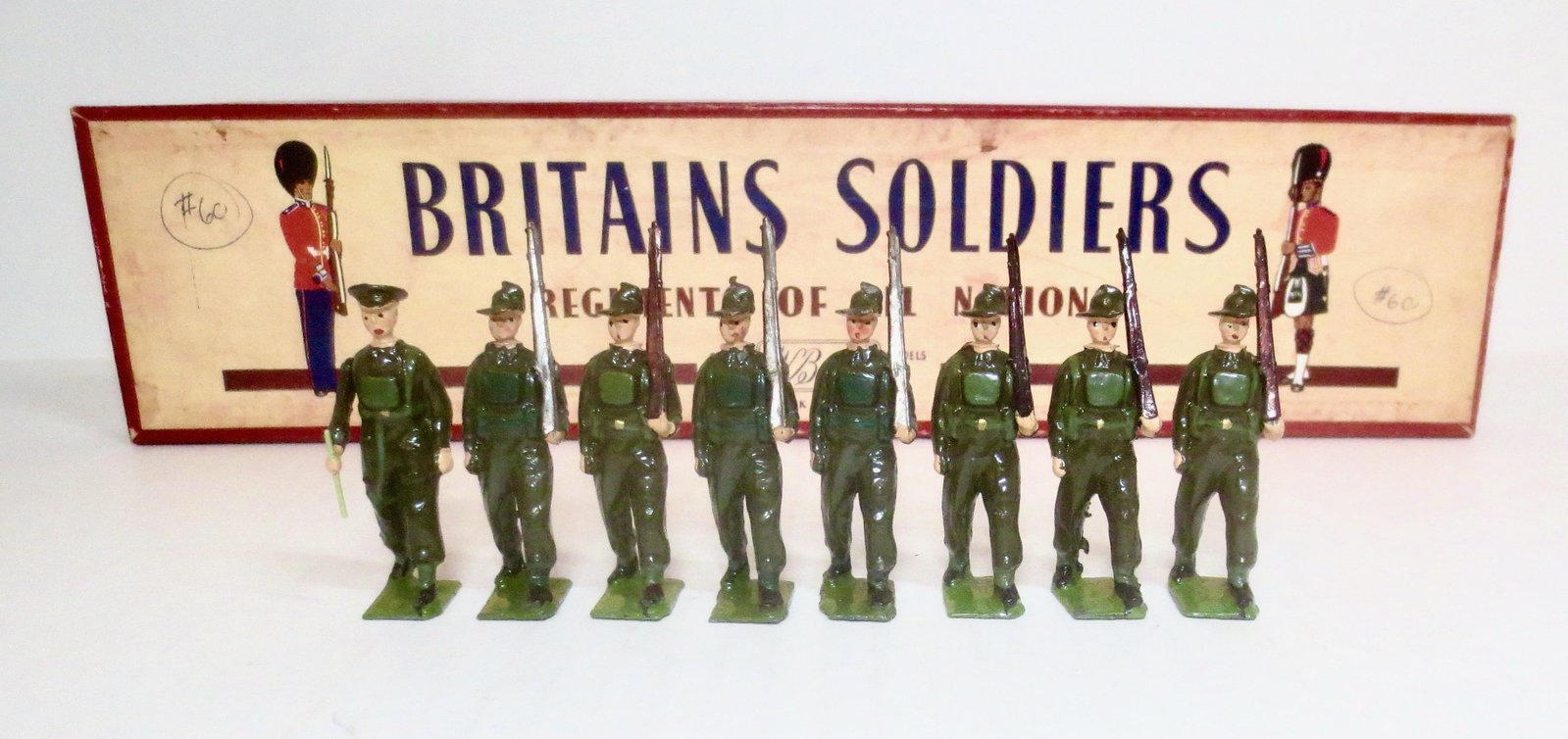 Britains #2031 Australian Army Infantry: Battle Dress. Post war issue. 8 pieces. Mismatched paint, otherwise in excellent condition. Box good.