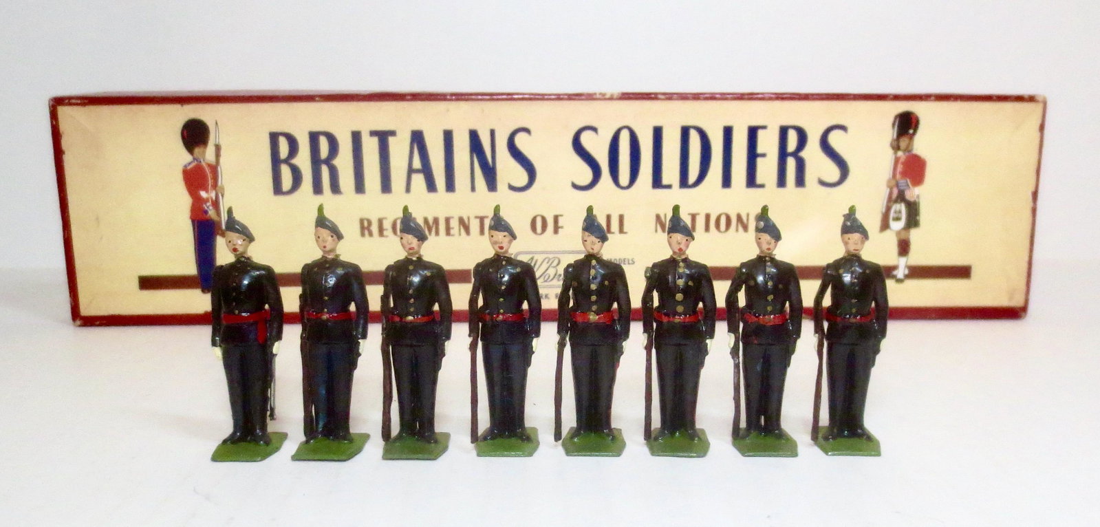 Britains #2090 Royal Irish Fusiliers: At attention, Number 1 dress uniform. Post war issue. 8 pieces. Near mint to excellent condition. Box excellent.