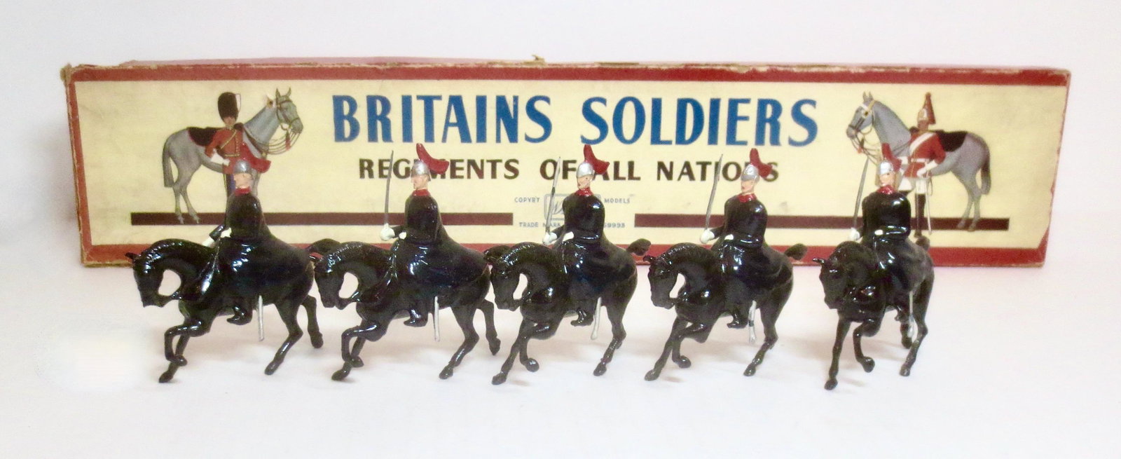 Britains #1343 The Horse Guards: In Winter Dress. Post war issue. 5 pieces. Mint to near mint condition. Box poor.