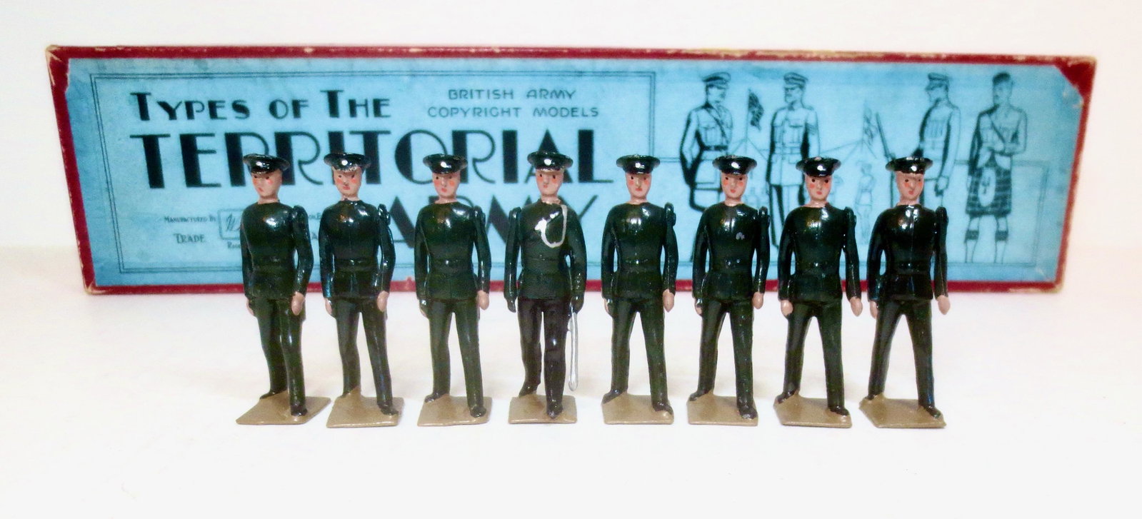 Britains RARE #1618 Regulars & Territorials: Rifle Regiments. Walking out in Dress Green Uniforms. Circa 1938-1941 only. 8 pieces. Pristine condition. Box excellent with corrugated backer and slotted insert.