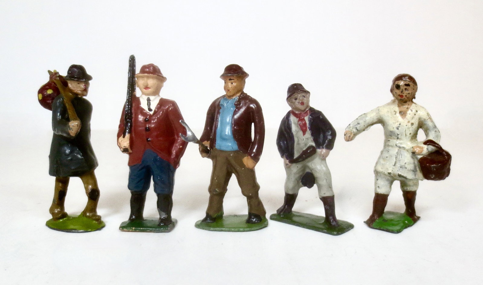 Pixyland Farm & Village Figures: Tramp, Game Hunter, Land Girl, Farmer with pitchfork, and Village Fool. 5 pieces. Near mint to very good condition. Unboxed.
