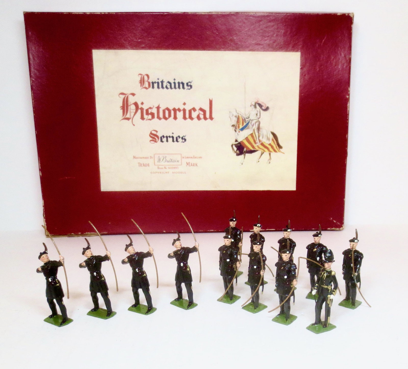 Britains #2079 Royal Company of Archers: Post war issue. 13 pieces. One broken hand, the rest in mint to near mint condition. Box fair (2 top corner splits, one top side split).