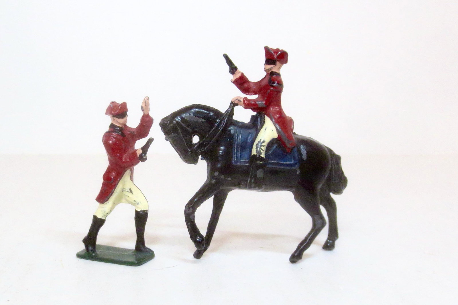 Crescent Dick Turpin Highwayman: The most famous highwayman of all, Dick Turpin, dressed in red with his bandit's mask. Two poses, mounted & on foot. Good condition (replacement pistols). Unboxed.