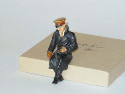 Elastolin Porcelain Headed Seated Hitler: Elastolin Porcelain Headed Seated Hitler with Moveable Arm, in Trench Coat From Tippco Tinplate Car.