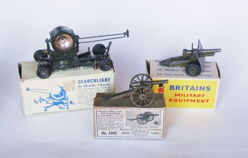 Britains Guns: Britains Guns Set #1263 Royal Artillery Gun, Set #2026 25 Pounder Gun and Set # 1718 Searchlight on Mobile Chassis with Original Boxes. 3 sets.