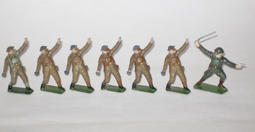 Britains Set # 1612 Khaki Gas Mask Grenade Thrower: Britains Set # 1612 Khaki Gas Mask Grenade Throwers with Non Matching Officer. Pre and Post War- Unboxed. 7 Pieces.