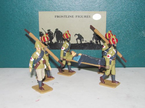 Frontline Figures Colonial Classics F.A.I. Britis: Frontline Figures Colonial Classics F.A.I. British, First Aid Team, Officer & Stretcher Bearers. 6 pieces with box