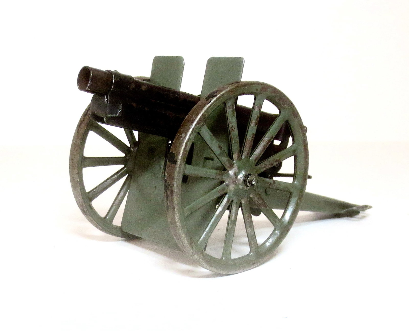 Lineol Cannon: 7" long. Very good condition. Unboxed.