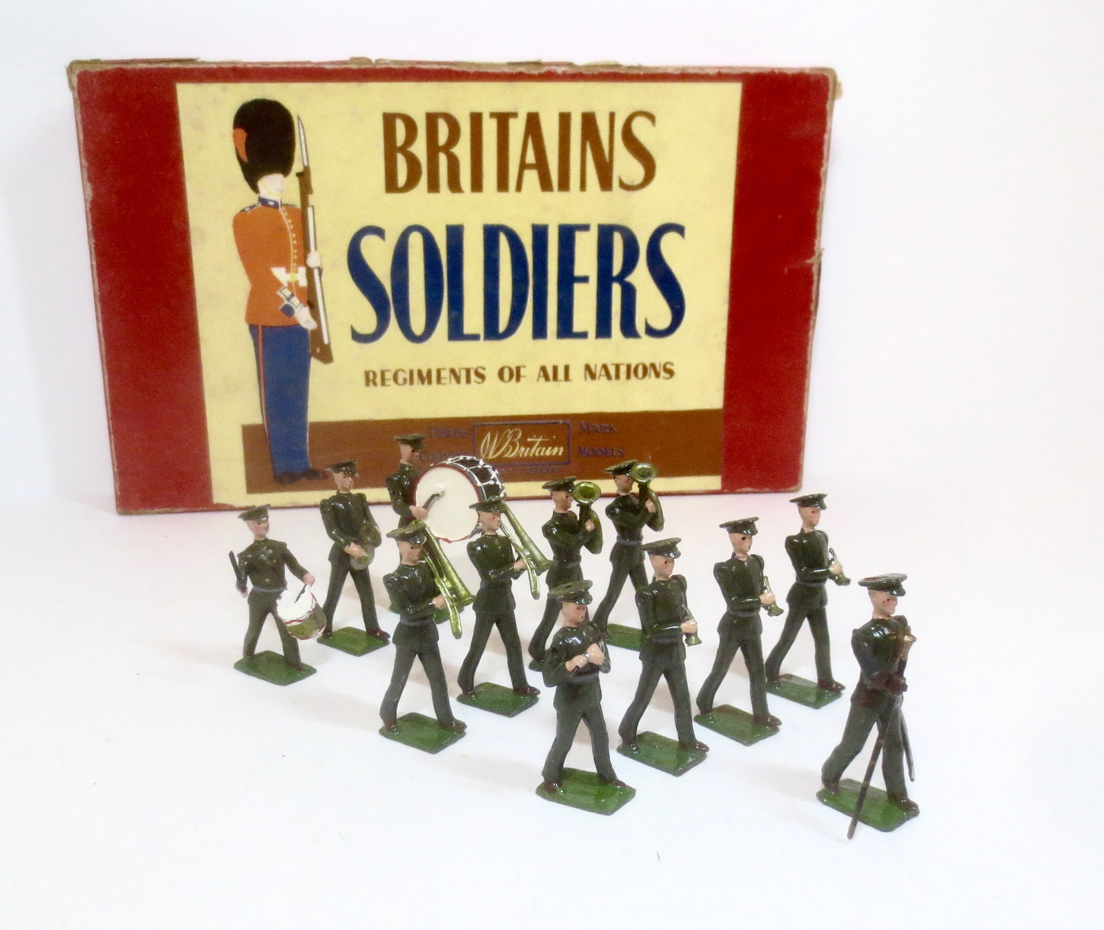 Britains #1301 U.S.A. Military Band: Scarce post war issue. Active Service Dress. 12 pieces. Mint to near mint condition. Box good with some fading & edge wear, and one top side split.