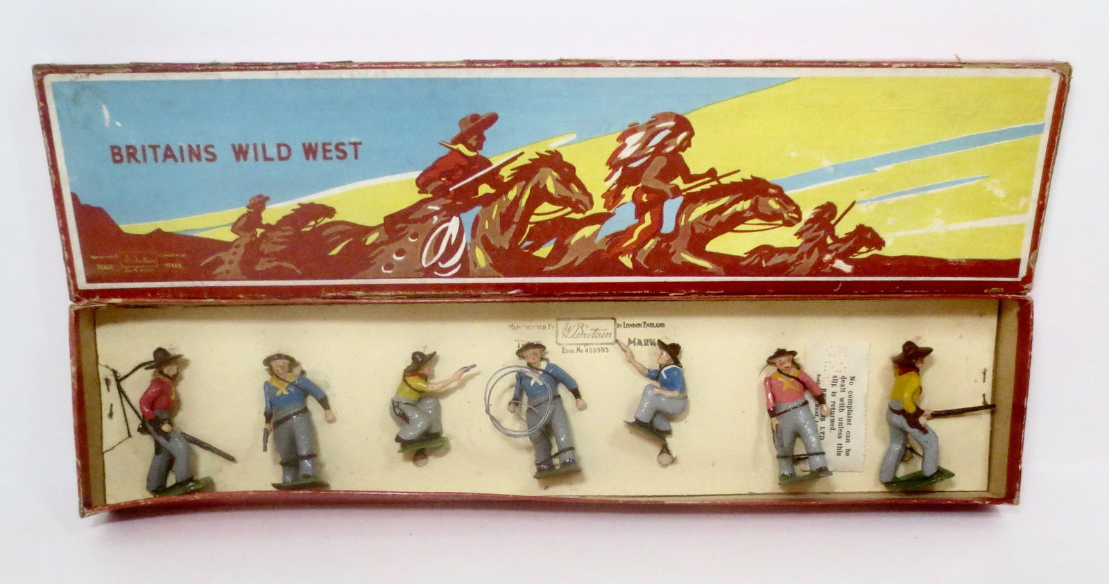 Britains #183 Cowboys on Foot: Post War 1947-59. 7 pieces. Mint condition, tied to card in box. Box poor (missing part of top side).