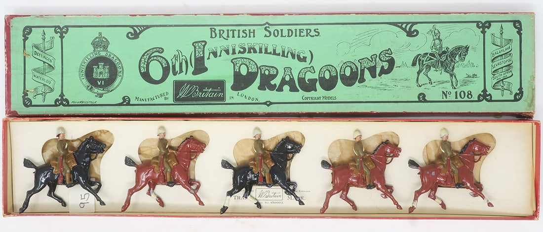 Britains set #108, 6th Inniskilling Dragoons,: service dress in original box, very good, helmets and horse fetlocks embellished in white paint; box good, 5 pieces, (c. 1935)
