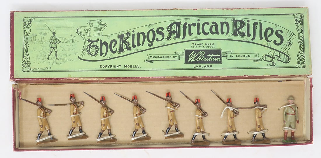 Britains set #225, King's African Rifles: in original box with European officer (from Set 1294?), very good, box fair; one edge of base damaged and partly detached, no tie card, 9 pieces, (c. 1935)