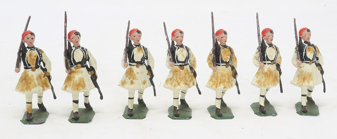 Britains set #196, Greek Infantry Evzones: at the slope, white tunics, good, varnish discolouration, may clean off with care; one missing, 7 pieces, (c. 1959)