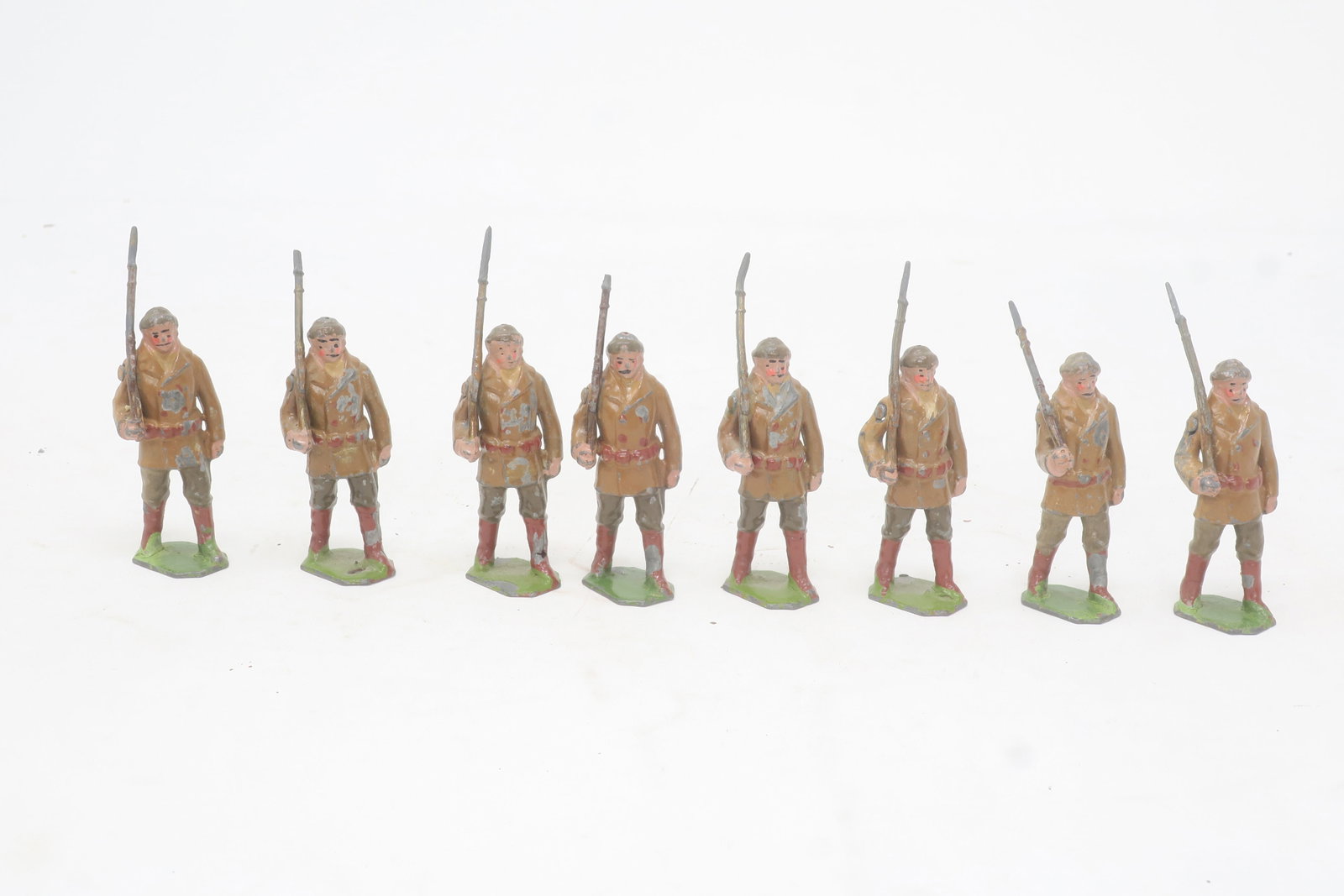 Britains set #214 Royal Canadian Mounted Police,: winter dress at the slope, hard to find, fair-good,1 arm glued, 2 bayonets damaged, 8 pieces, (c. 1930)