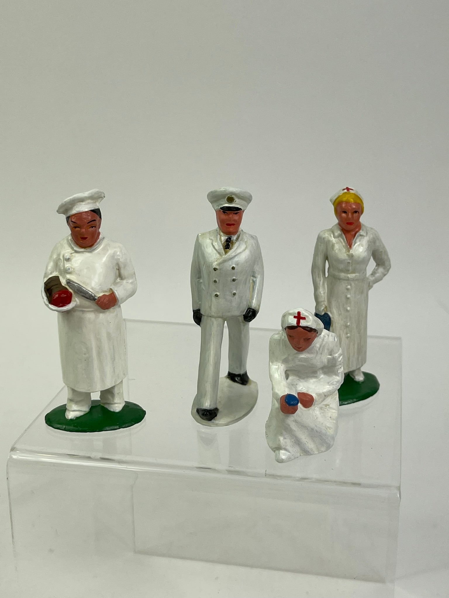 Barclay Medical Group: 4 pcs in excellent condition. 70mm metal. All appear to have minor paint restoration. Included are B82 and B83 Nurses, B10 Cook with Roast and B56 Naval Officer.