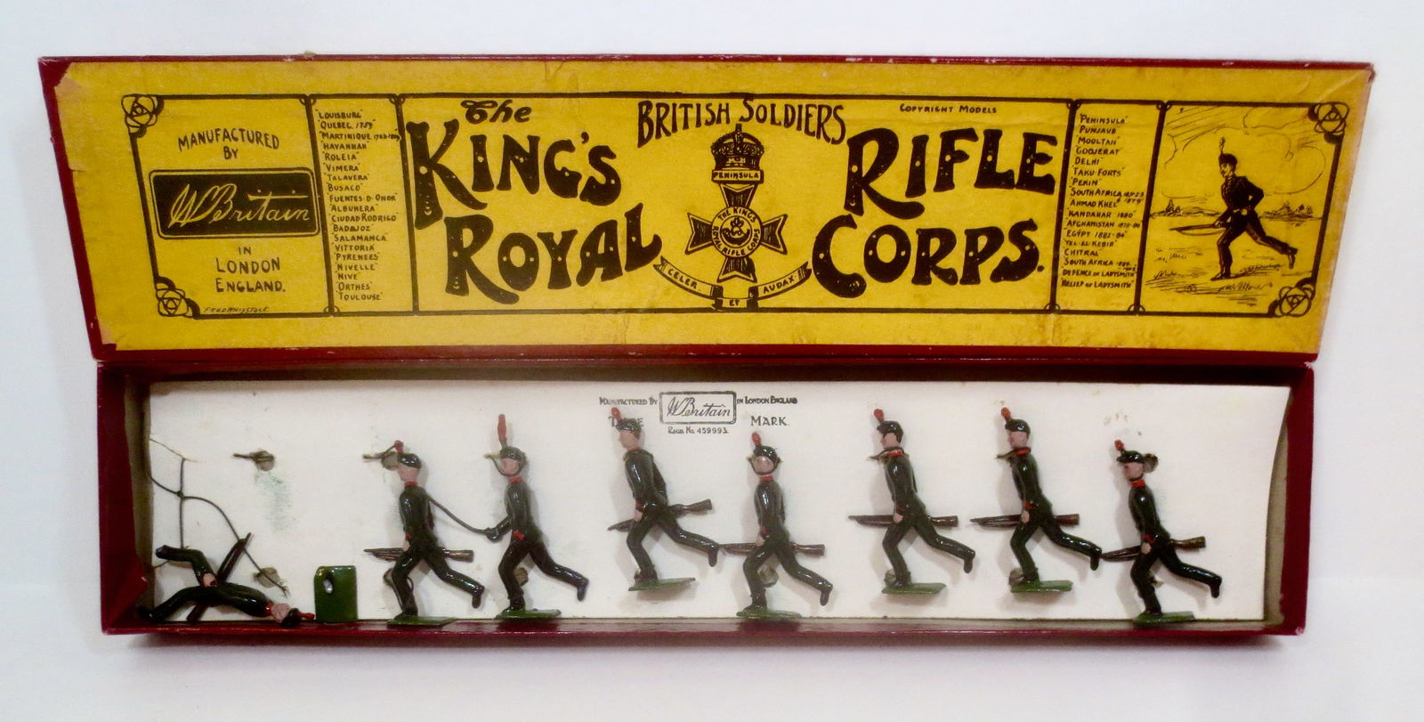 Britains #98 Kings Royal Rifles Corps: Pre war issue. 8 pieces. One broken from base, the rest in near mint to excellent condition, retied to card in box. Whisstock label box very good.