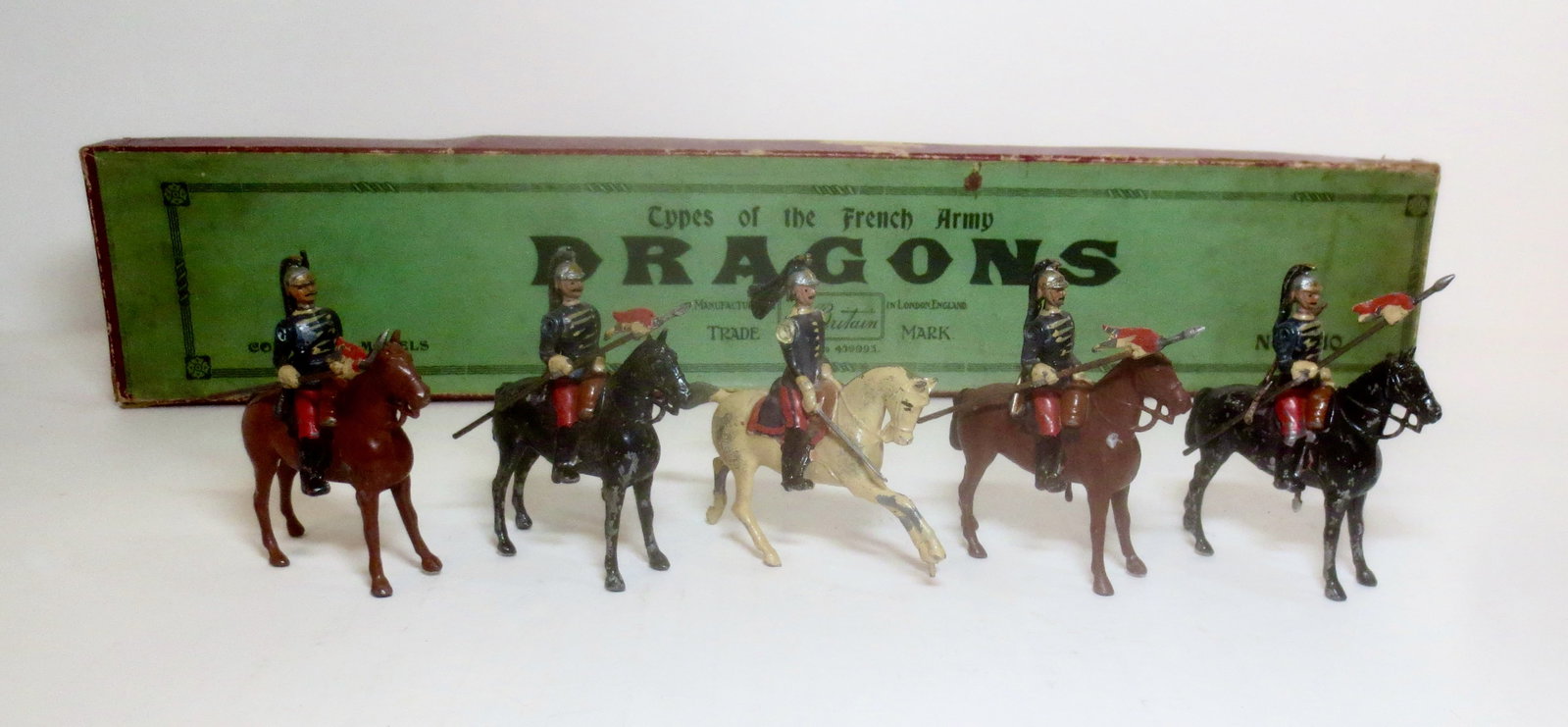 Britains RARE #140 French Dragons: Circa 1930's. 5 pieces. Good to fair condition (one lance tip repair). Box good, missing insert card.
