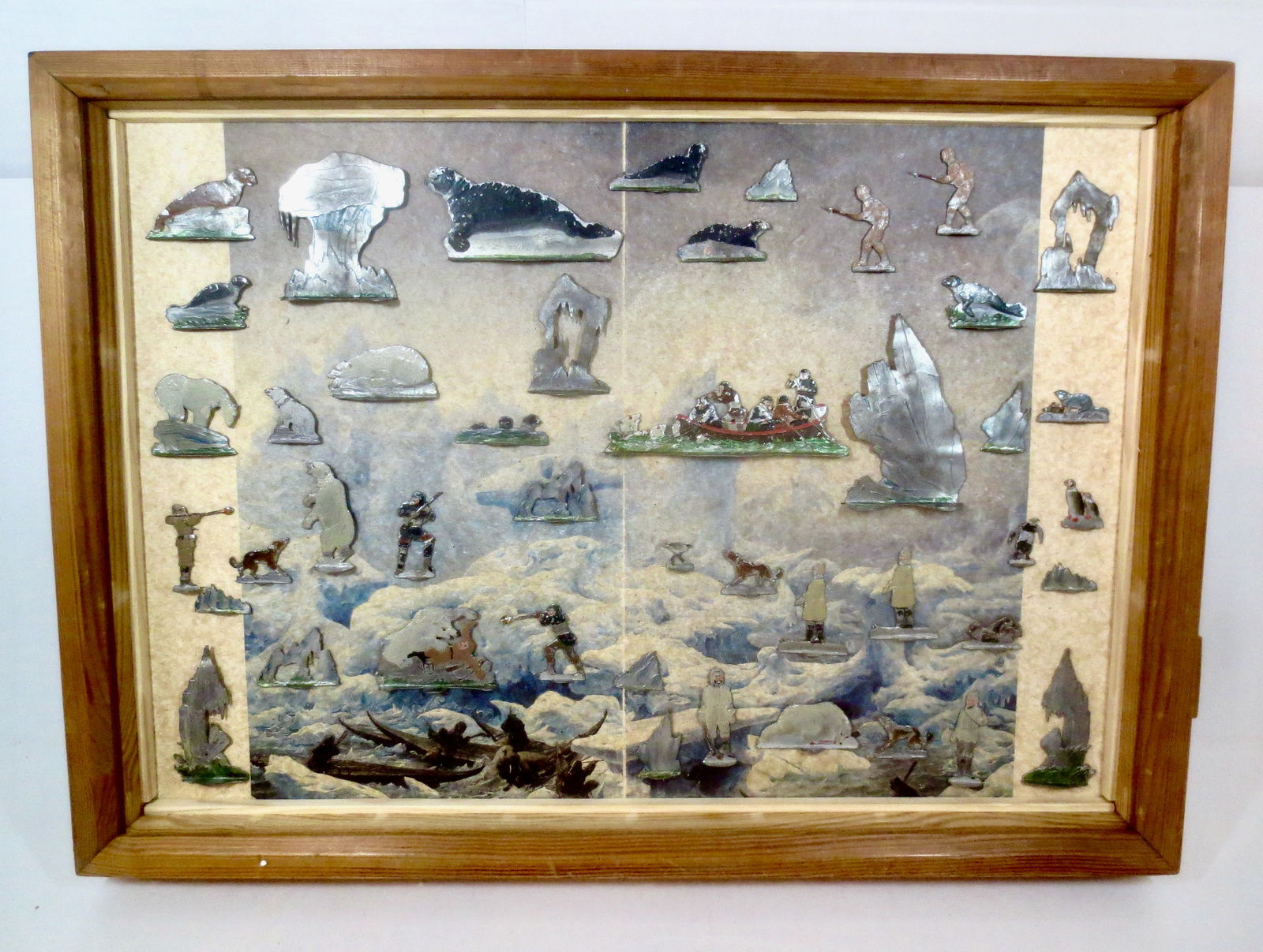 Heinrichsen "Polar Journey": Circa 1880. 45mm scale. Comes with backdrop and wooden window box. Good condition, paint loss and fading commensurate with age.