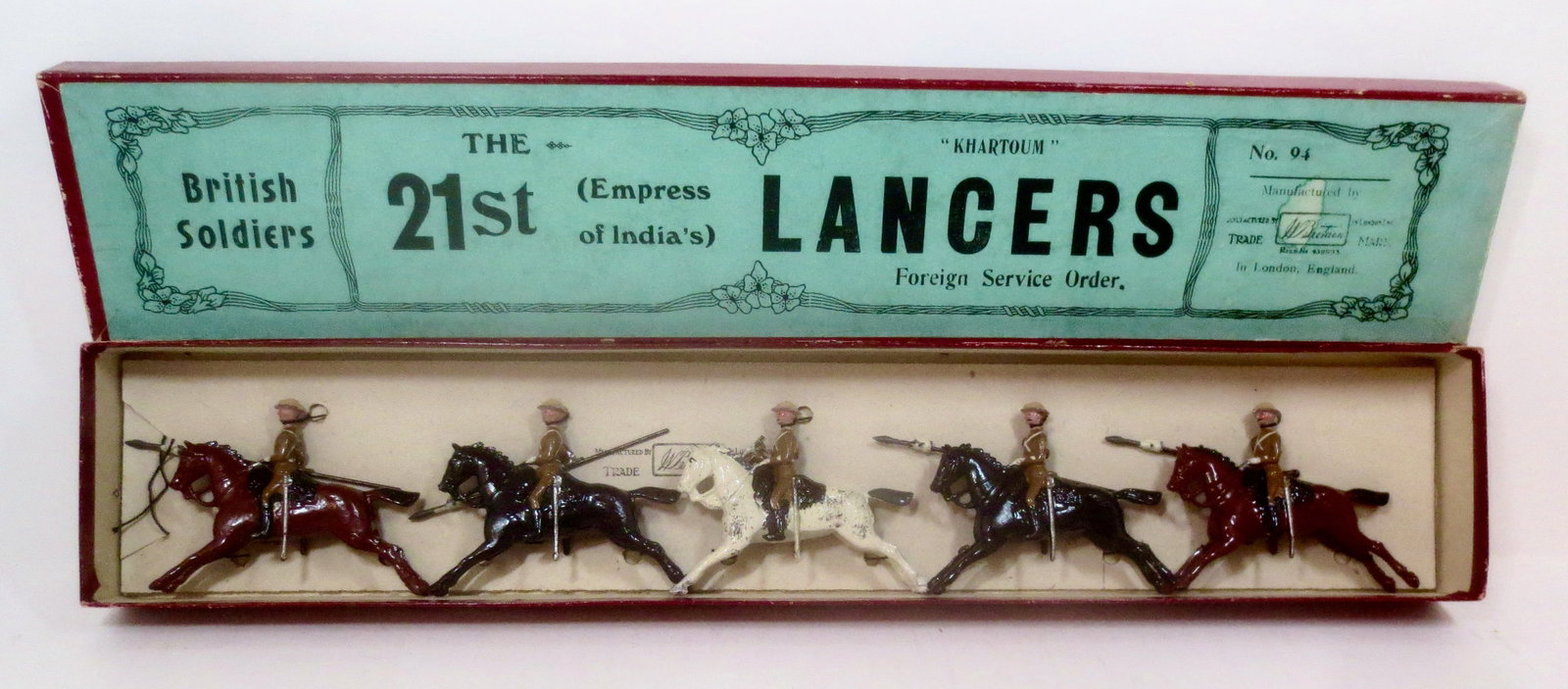 Britains #94 21st Empress of India's Hussars: VERY RARE set. In sand colored tunics and steel helmets. Circa 1916-1915 only. 5 pieces. Mint to near mint condition, tied to card in box. Box excellent.