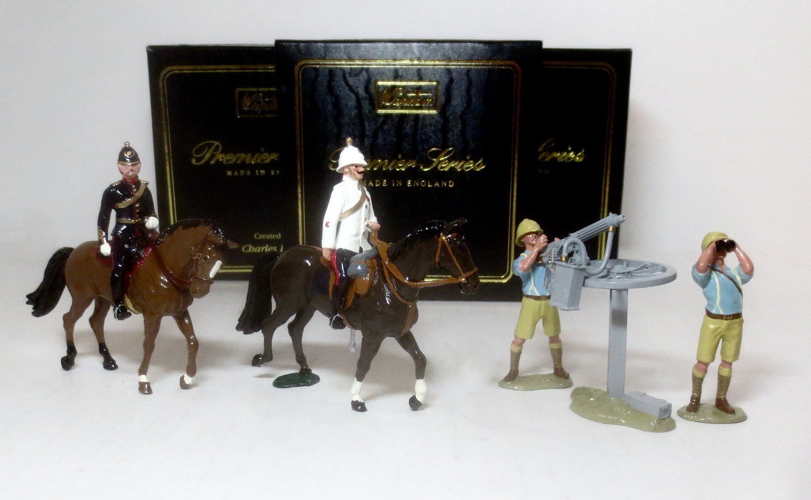 Britains Premier Sets: Mounted Royal Artillery Officer #8910, Mounted Regimental Sergeant Major R.A., and Vickers Machine Gun & Team #8917. 5 pieces. Mint condition. Boxes excellent.
