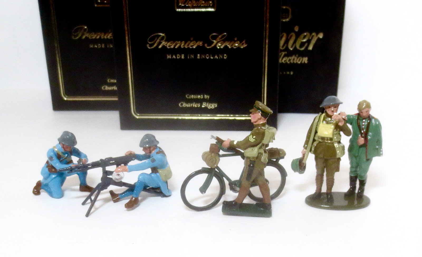 Premier World War One Assortment: French Machine Gun Section #8939, British Sergeant of The Dorset Yeomanry #8940, and British Soldier Helping Wounded Soldier #2006. 6 pieces. Mint condition. Boxes excellent.
