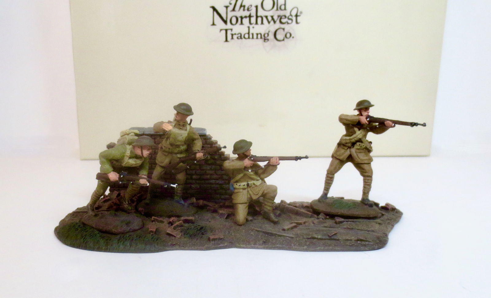 The Old Northwest Trading Company: "Over There" 4 U.S. Doughboys Advancing with Scenic Base. 5 pieces. Mint condition. Box excellent.