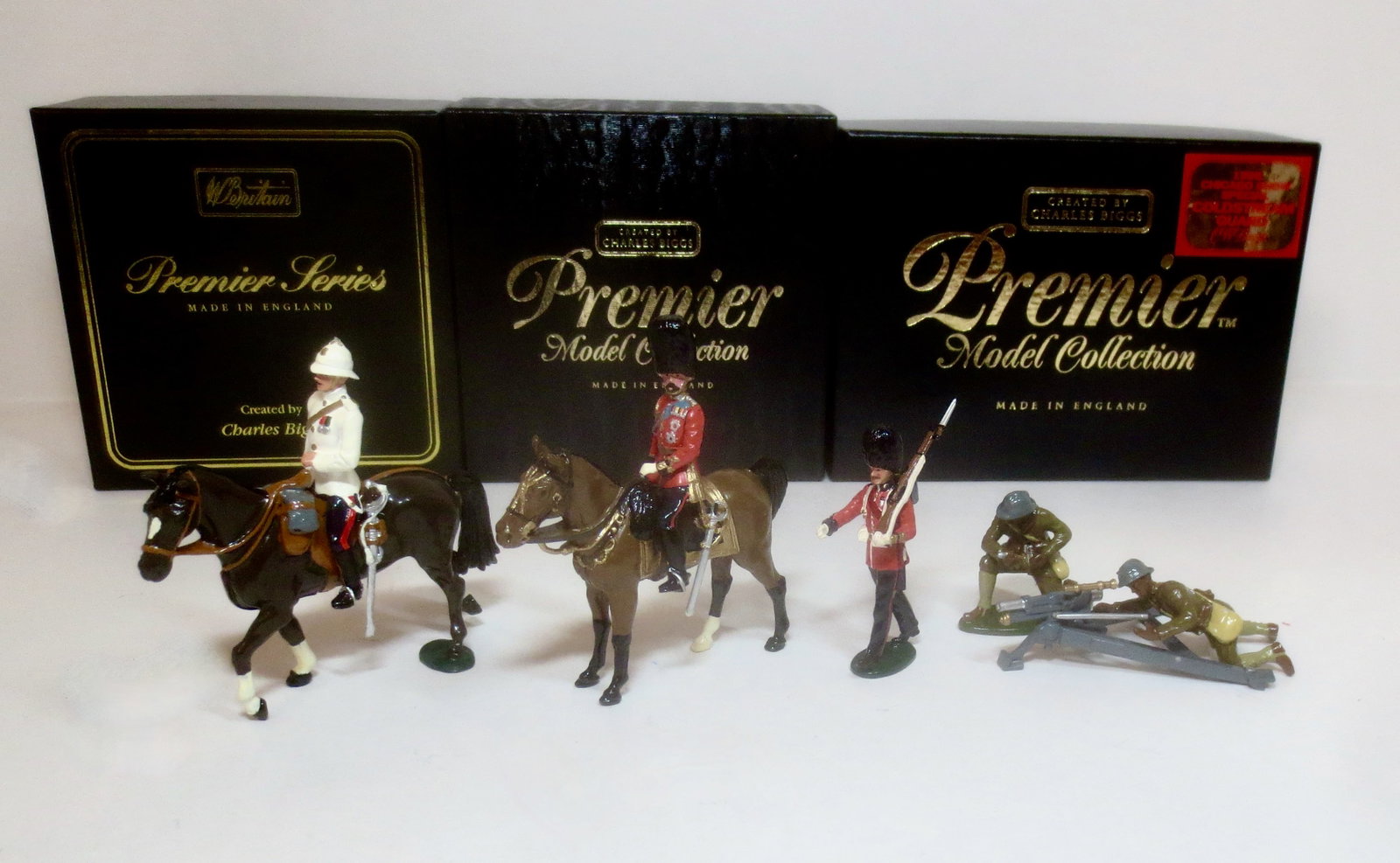 Premier World War One Assortment: Mounted Regimental Sergeant Major R.A. #8916, HRH King George V Mounted on Horse #9903, 1998 Chicago Show Special Coldstream Guard, and U.S. Black Machine Gun and Team #2009. 6 pieces. Mint condition.