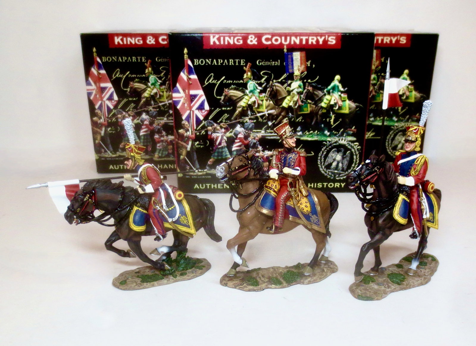 King & Country Napoleonics: Charging Dutch Lancer #NA161, Dutch Lancer General #NA164, and Dutch Lancer on Walking Horse #NA160. 3 pieces. Mint condition. Boxes excellent.