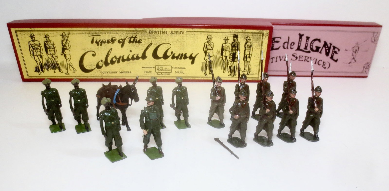 Britains #1893 Indian Army Service Corps: And French Infanterie de Ligne #192. 15 pieces. Near mint to excellent condition (one loose rifle, one mismatched French Infantry). Reproduction boxes in good condition.