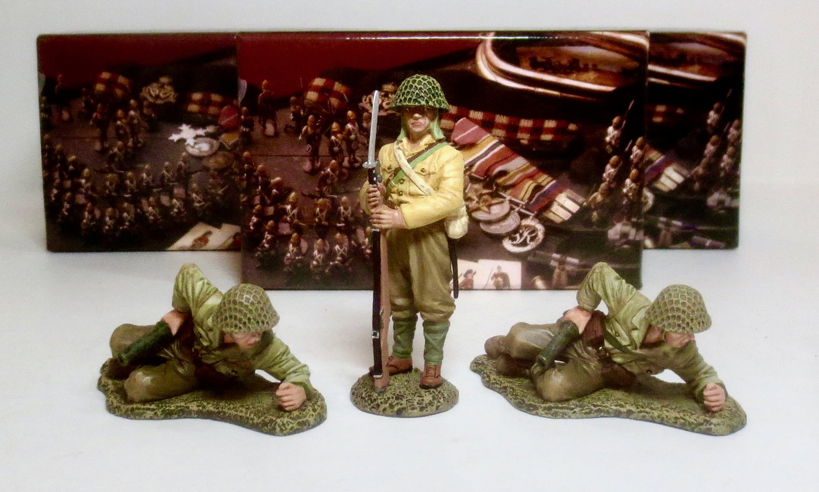 King & Country WWII Japanese Soldiers: #JN073 Japanese soldier with rifle and bayonet, and two #JN032 Type 89 Grenade Dischargers. 3 pieces. Mint condition. Boxes excellent.