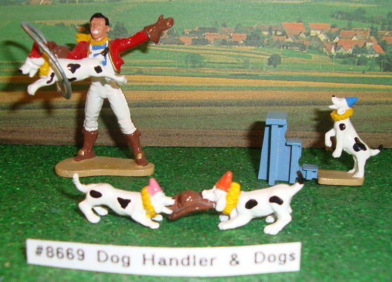 Britains Set # 8669 Dog Handler & Performing Dogs: with original box. 3 pieces.