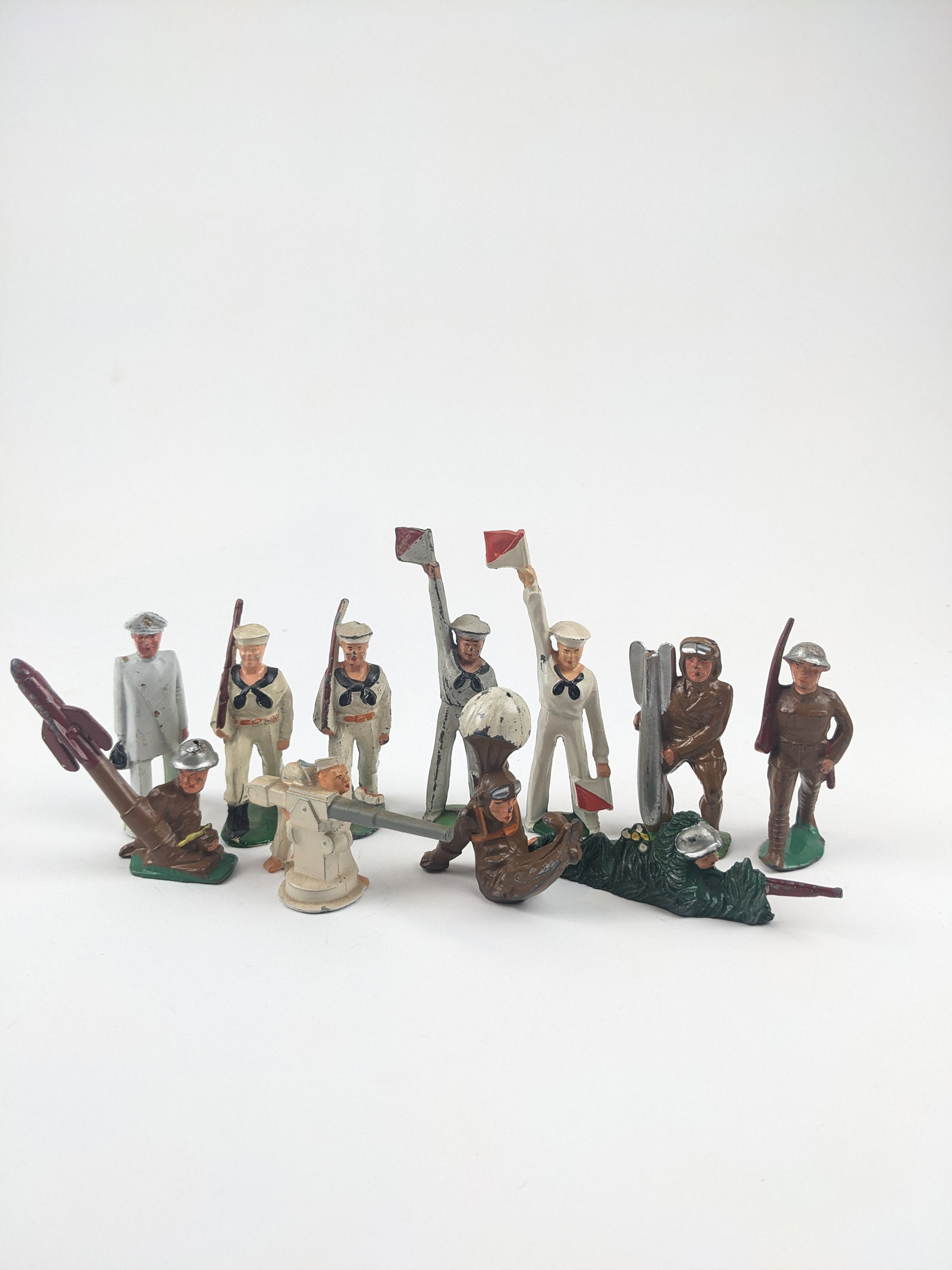 Manoil Various Poses: 11 Pieces Condition Good-Very Good No Box