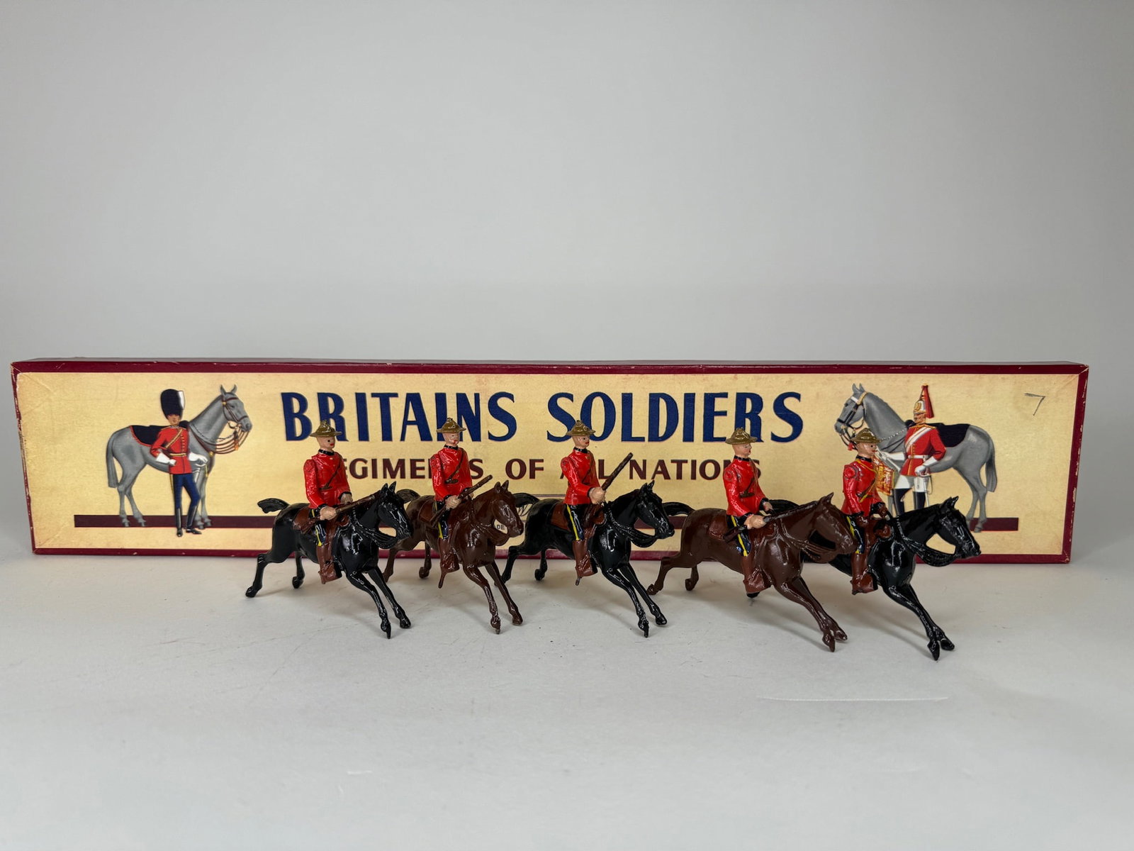 Britains No 1349 Royal Canadian Mounted: Police. Post war. 5 pieces. Condition excellent. Box excellent with missing tie card.