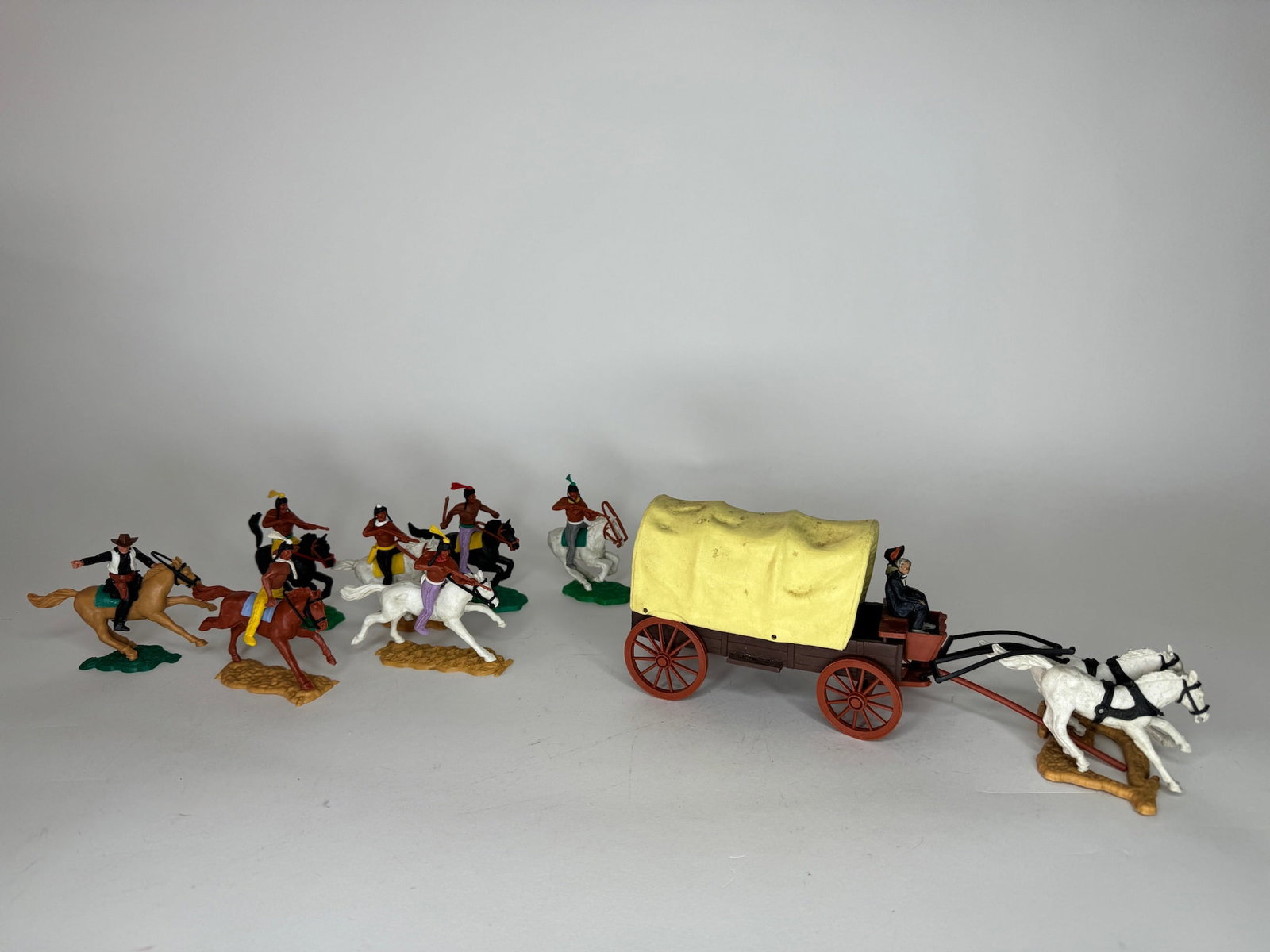 Timpo Indians Attacking on Stagecoach: Condition excellent with broken rear leg on one horse. Unboxed.