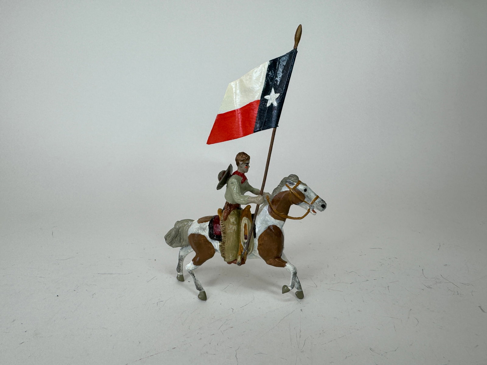 Bill O'Brien Texan Cowboy with Flag: 1 piece. Condition excellent.