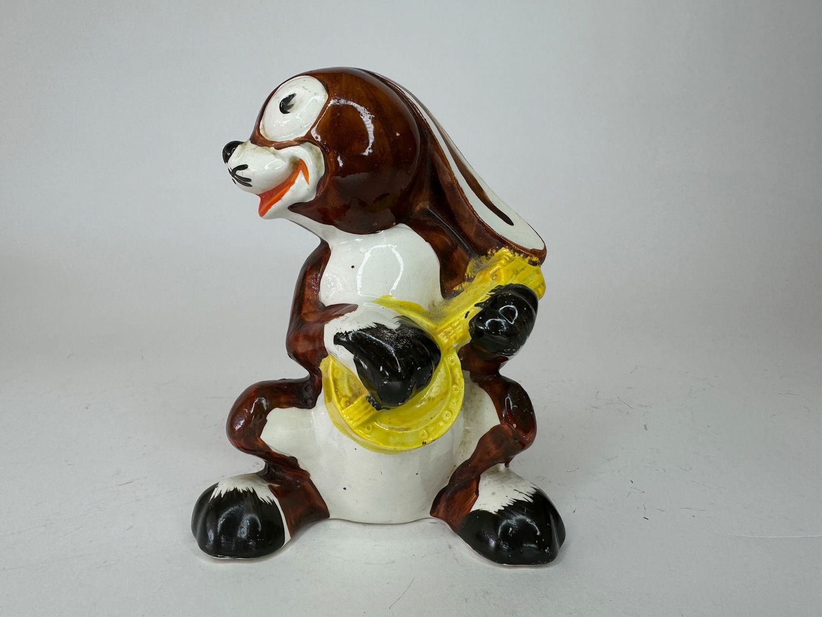 Rabbit with Banjos Porcelain Still Bank.: Made in France. 5" high. 1 piece. Condition excellent.