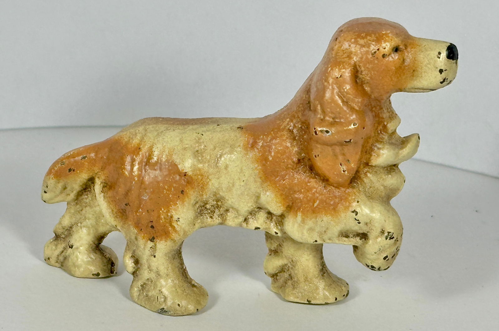Cocker Spaniel Cast Iron Bottle Opener: John Wright Co., PA. 3-3/4"L x 2-3/4"T. c.1960 . Catalog No. F80