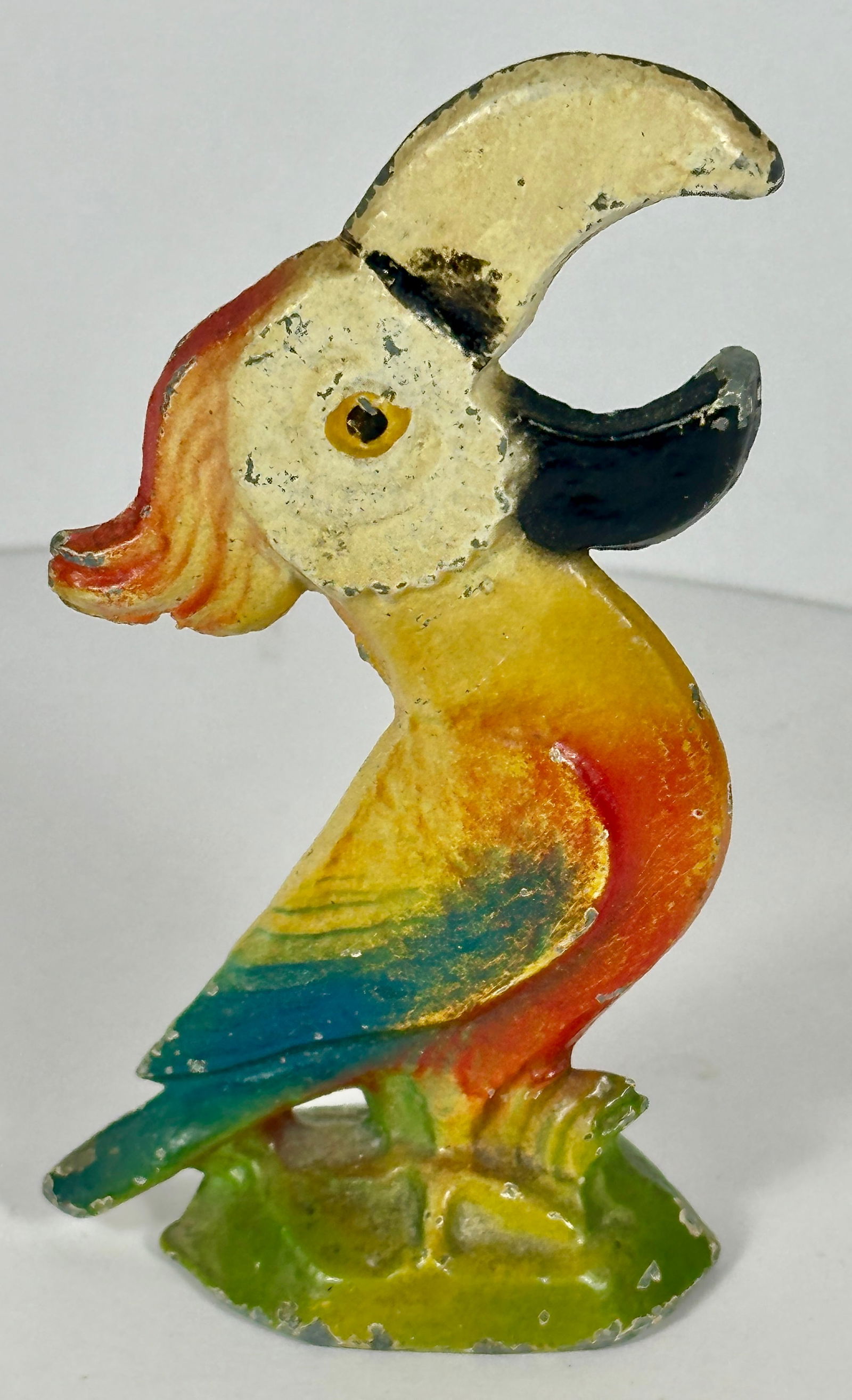 Parrot Cast Iron Bottle Opener: John Wright Co., PA. 4"T. c.1950. Catalog No. F111