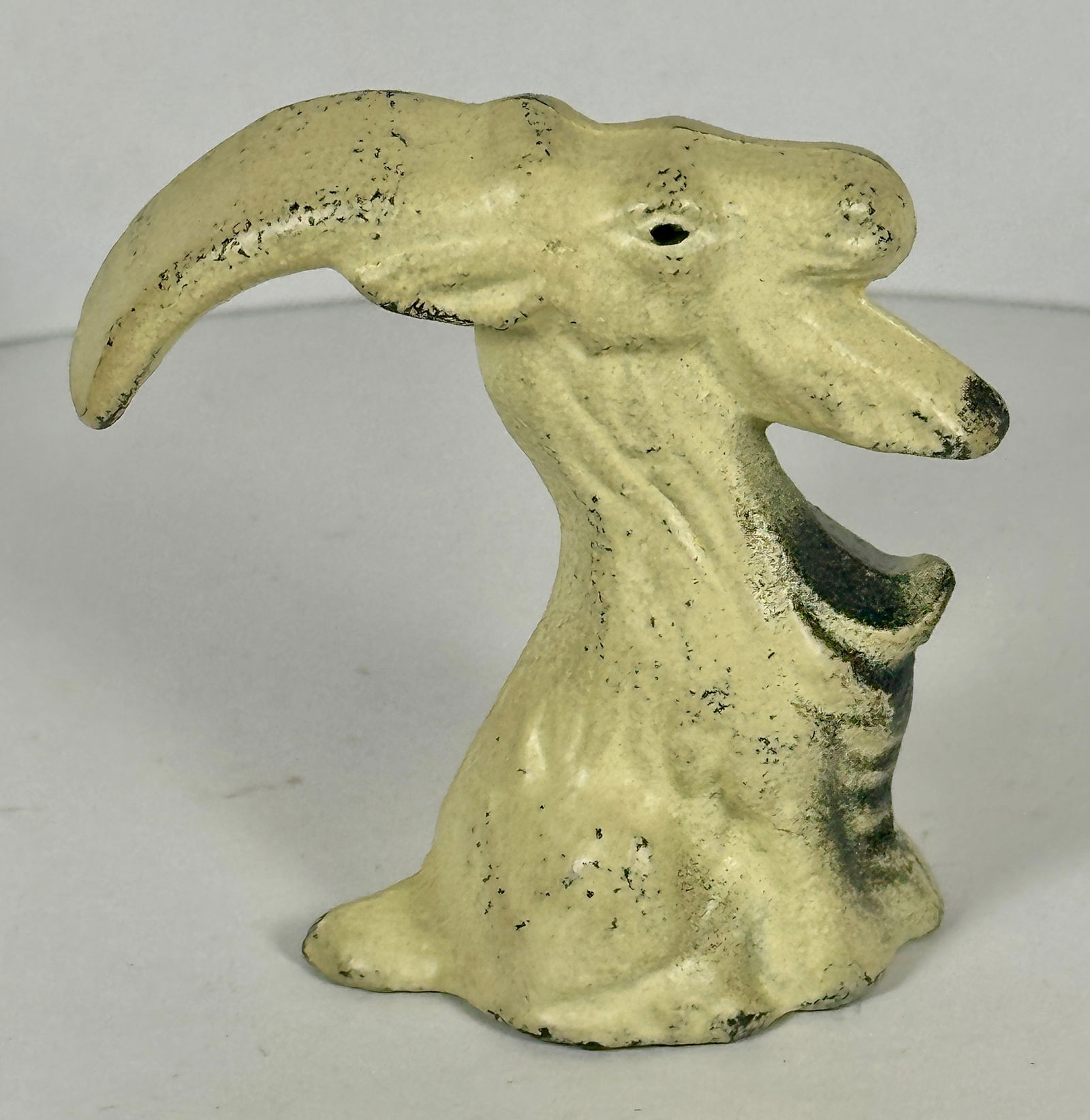 Goat Cast Iron Bottle Opener: John Wright Co., PA. 2-3/4"T. c.1950. Catalog No. F74