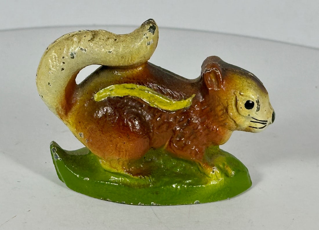 Squirrel Cast Iron Bottle Opener: John Wright Co., PA. 2-7/8"L. c.1950. Catalog No. F92