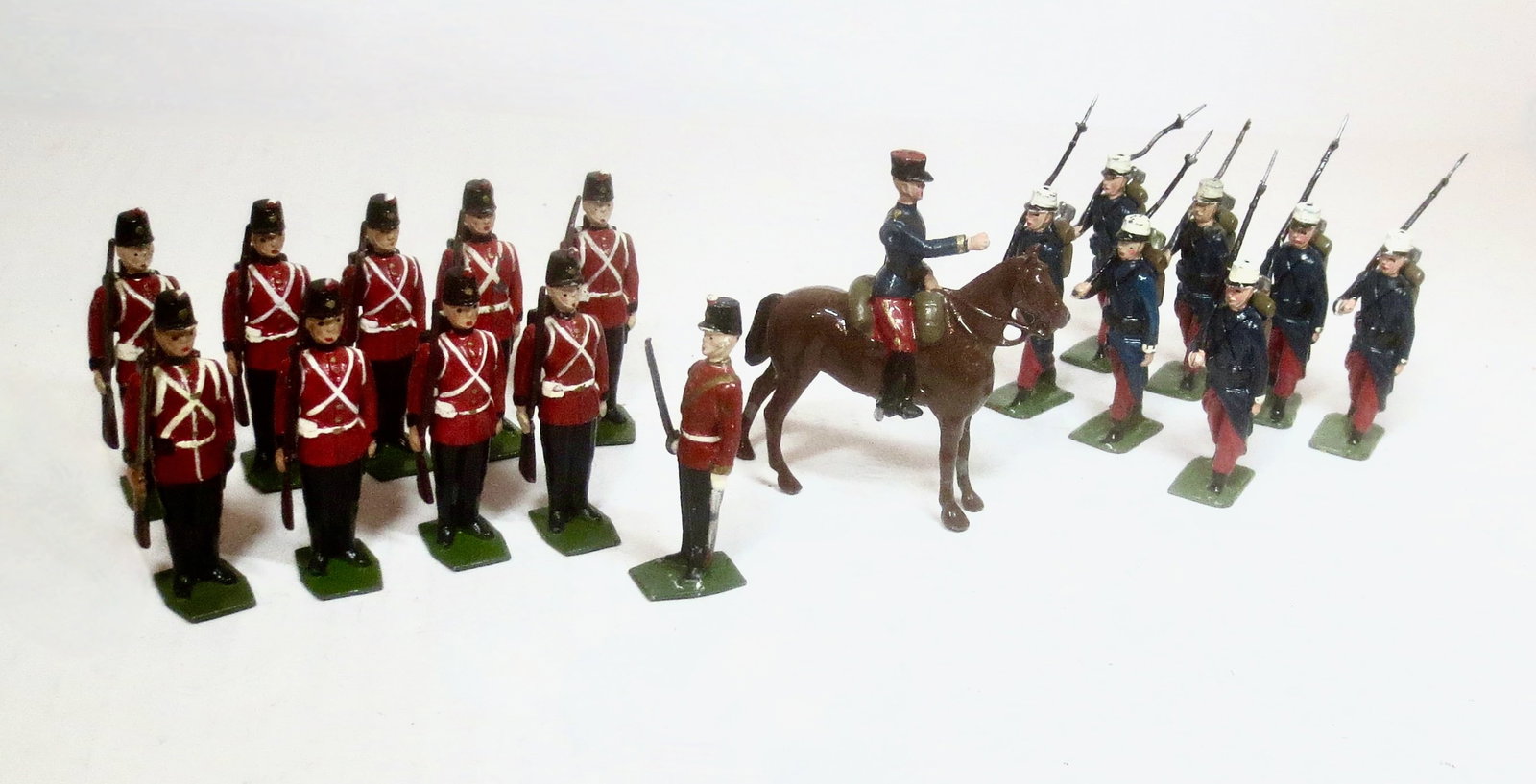 Britains From Set #2418 Fort Henry Guards: And From #1711 French Foreign Legion. 18 pieces. One missing bayonet, others in excellent to good condition. Unboxed.