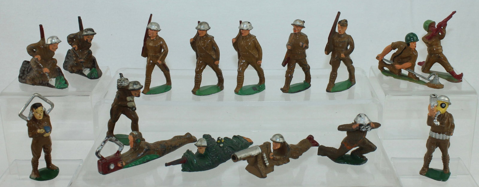 Manoil Communications Lot: Lot includes M105 Marching with Slung Rifle, M87 Camoflauge Sharp Shooter, M94 Gas Mask with Flare Pistol, M116 Radio Operator Standing, M117 Radio Operator Lying Down, M119 With Barbed Wire and Other
