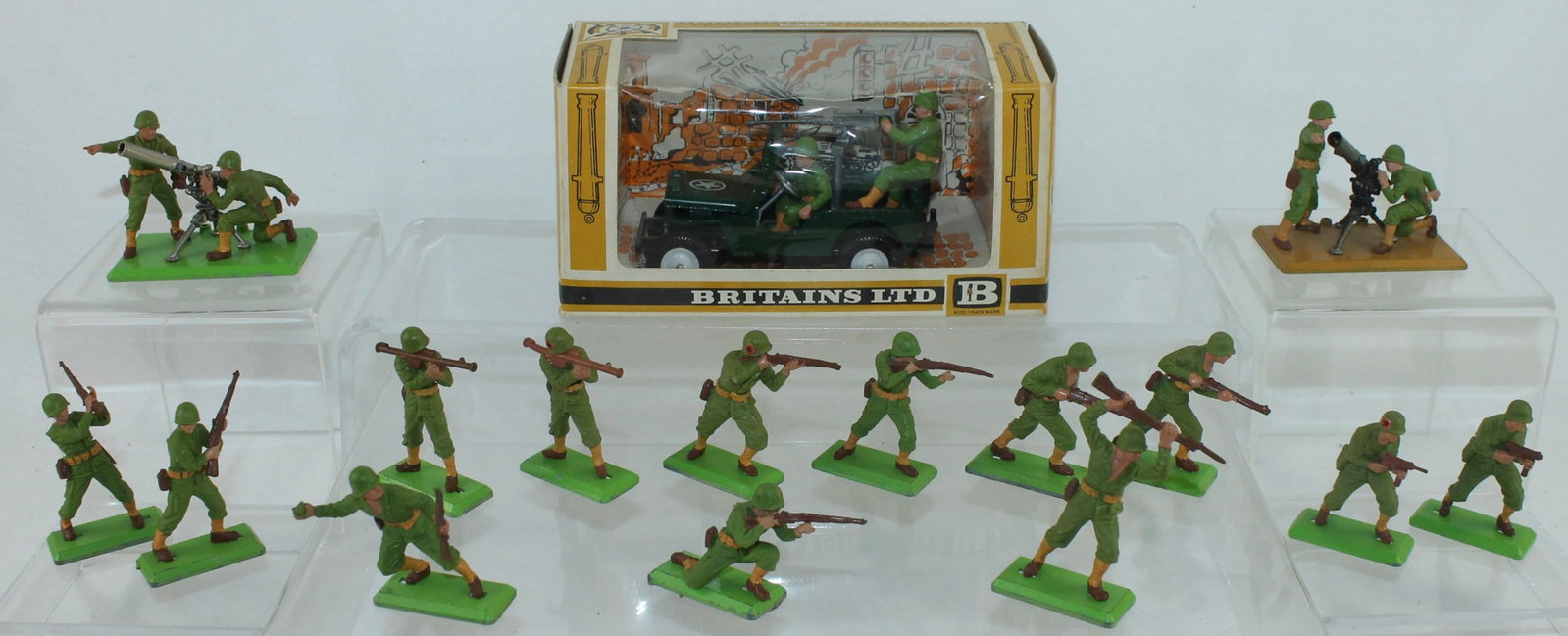Britains Set 9786 US Jeep and GIs: Deetail Series. Lot includes Set 9786 US Jeep with Crew, 2 Bazooka Duplexes and 13 Infantry in Various Poses. 16 Pieces. Condition Very Good to Mint. One Grease Gun Barrel Broken. Box Good.