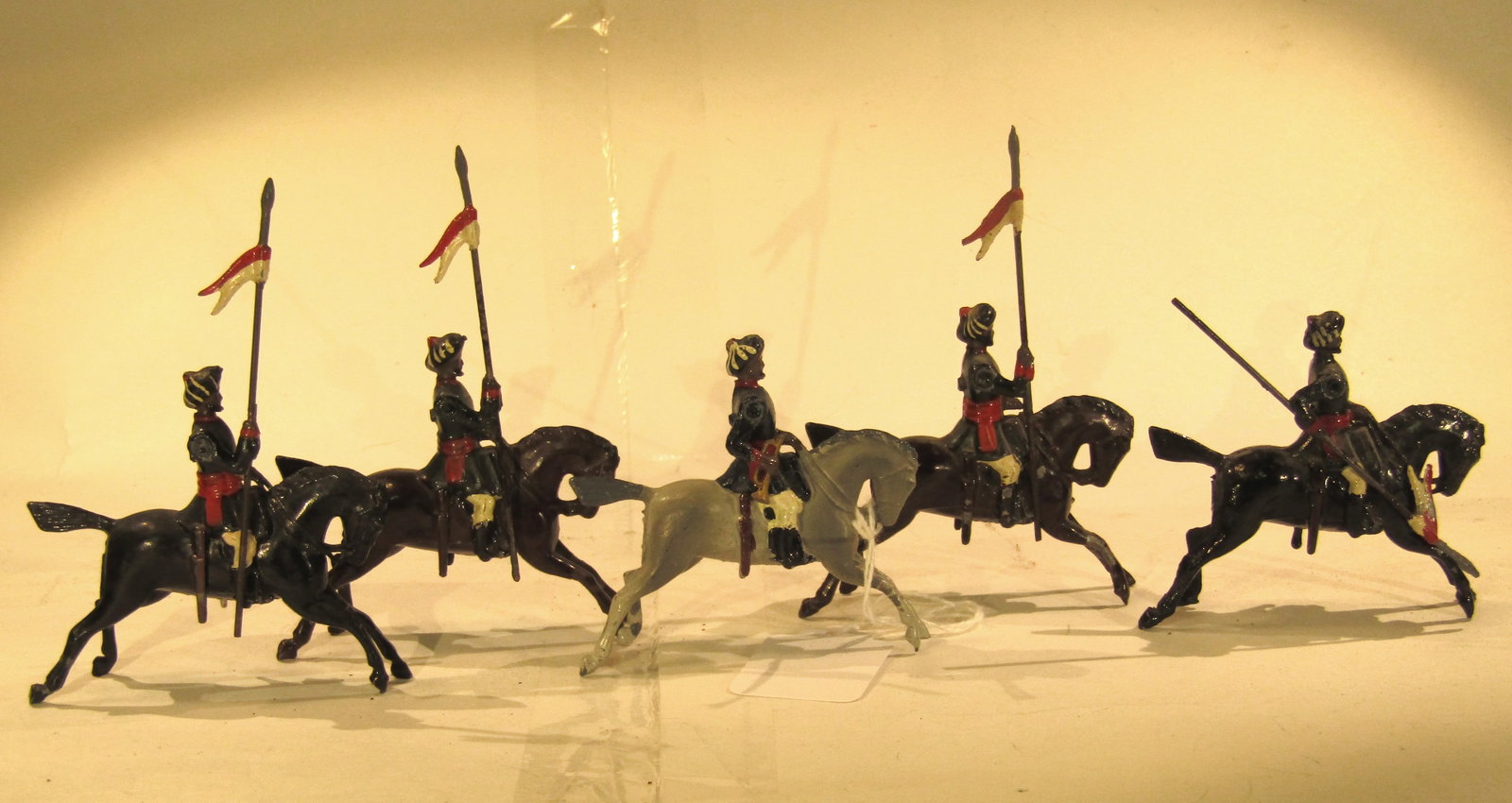 Britains No 66 Indian Lancers: Britains Ltd # 66. Duke of Connaught's Indian lancers. Post war Blue tunic Version. 5 pieces. Condition Very Good. Unboxed.
