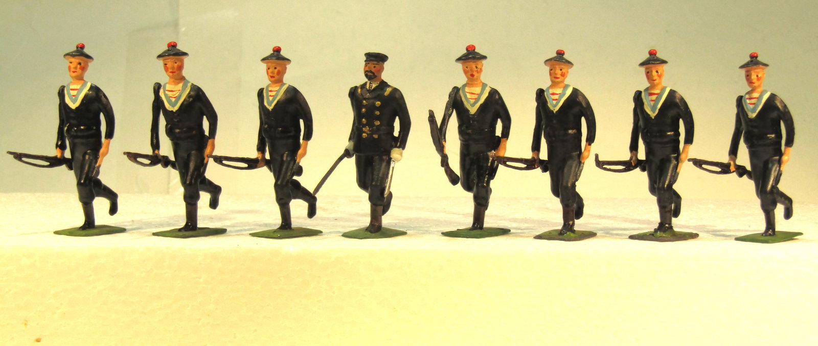 Britains No 143 French Matelots: Britains Ltd. # 143. French Matelots (sailors) running at the trail w/officer. Post war 1948-49 only. 8 Pieces. Condition Excellent. Unboxed.