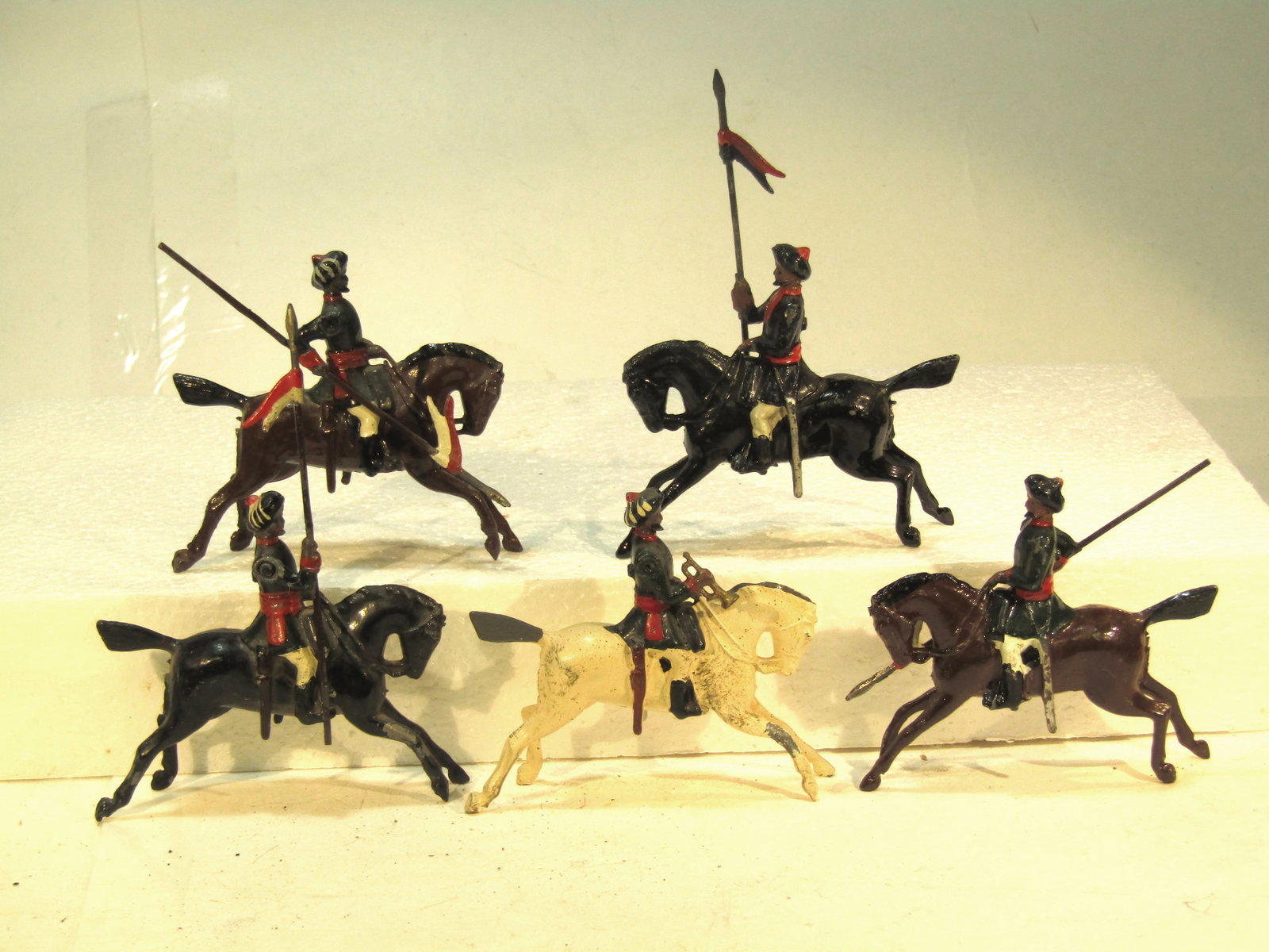 Britains No 66 Indian Lancers: Britains Ltd. # 66. Duke of Connaught's Own Indian lancers. Post war version in dark blue tunics. 1946-66. 5 Pieces. Condition Good. Unboxed.