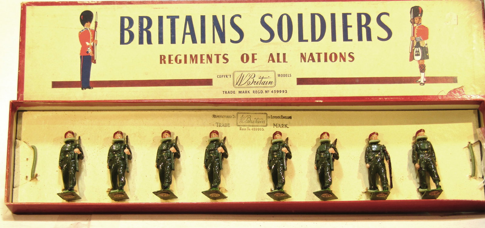 Britians No 2010 Airborn Infantry: Britains Ltd. # 2010. Airborne infantry (Red Devils) with officer and Bren Gun. 8 pieces total tied in to Regiments of All Nations box. Condition Very Good. Box Very Good.