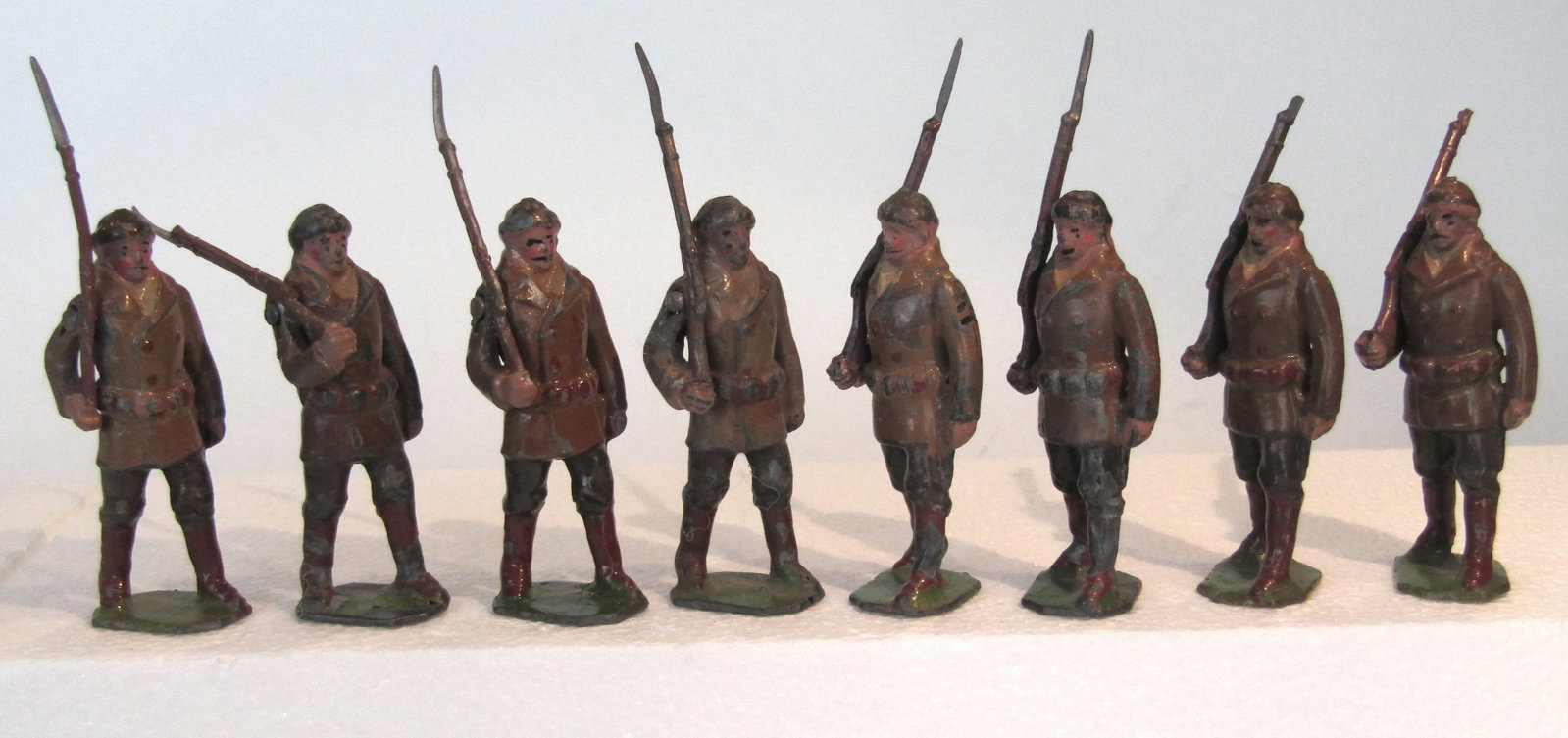 Britains No 214 Royal Candian Mounted Police: Britains Ltd. # 214. Royal Canadian Mounted Police, Dismounted, in Winter Dress. 8 police marching. Unique and only pre war (1922-41) as a full set. Condition Good. Unboxed.