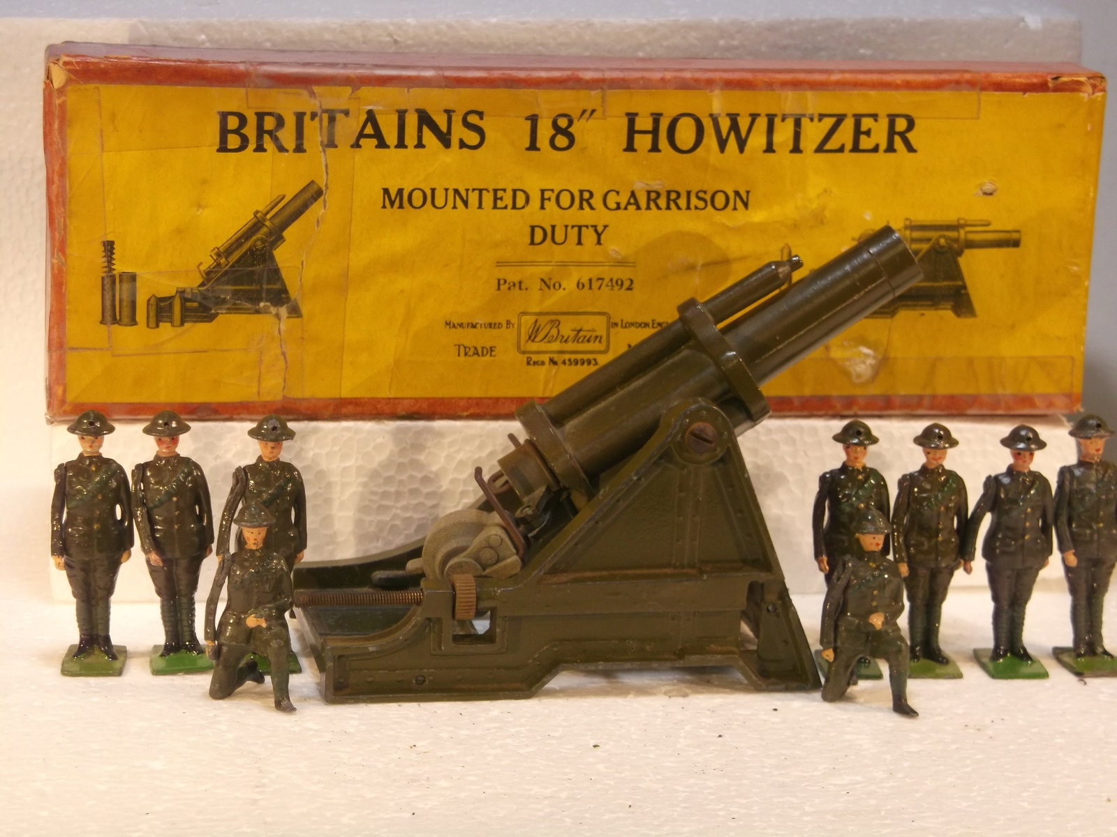 Britains No 2106 18-inch Howitzer: Britains Ltd. # 2106. 18" Heavy Howitzer in Garrison mount with original box and 9-man gunner crew (from #1730). Condition Very Good. Box Very Good.