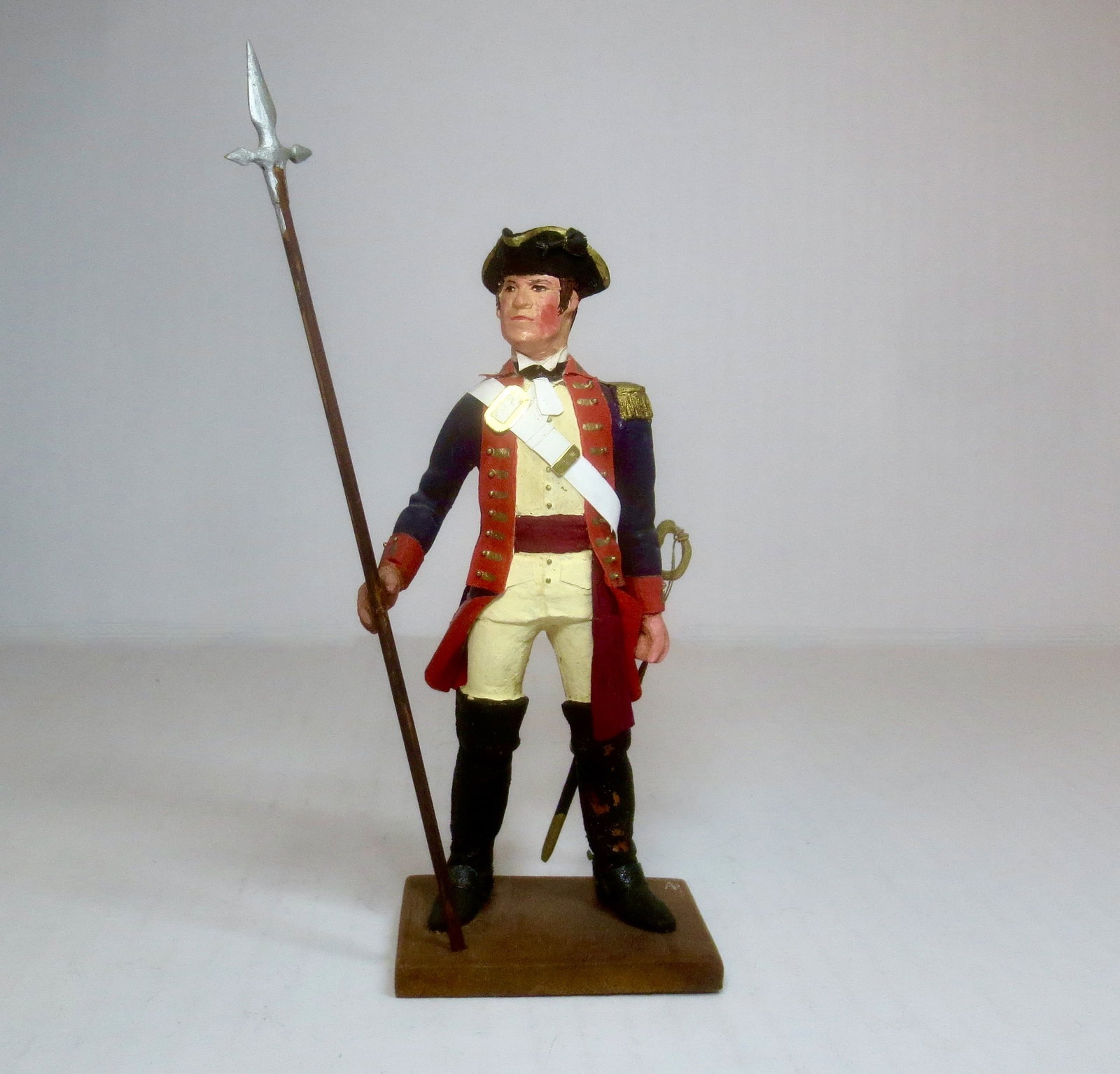 Pranzetti (Italy) U.S. 1771 Artillery Officer: Spectacular wooden figure. Hand-carved and painted wood soldier holding pike. 5.5" tall. Signed by the artist on base bottom. Pristine condition (minor paint loss on boots).